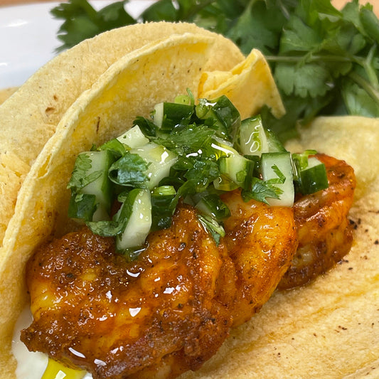 Shrimp tacos on tortilla 