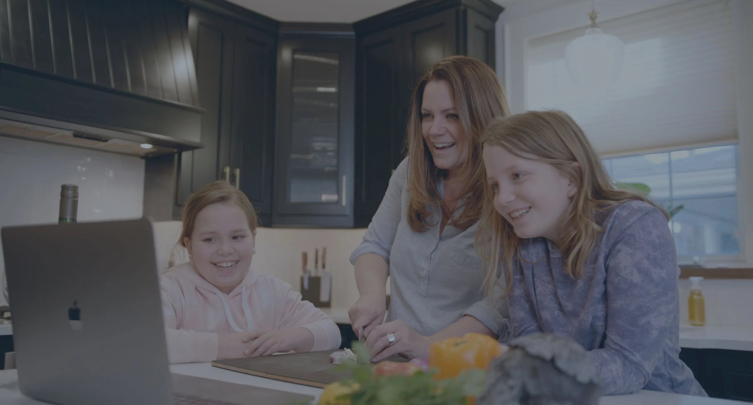 Happy family cooking a meal together